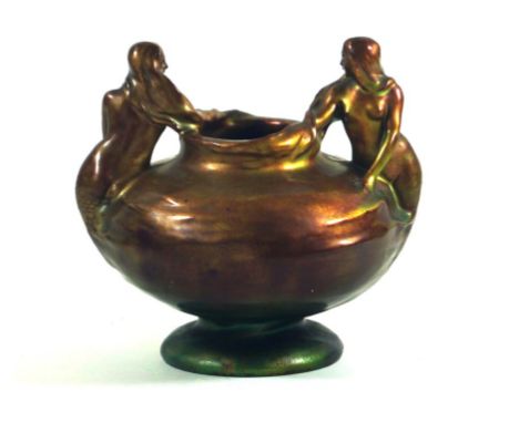 Art Nouveau, Zsolnay Pecs pedestal vase 
Eosin glaze, decorated with two semi-nude mermaids surrounding an urn vase on a lust