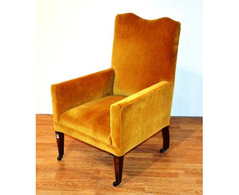 A vintage armchair, upholstered in gold velour, raised on mahogany supports, 92cm high CONDITION REPORT: Lot 498 - Minor mark