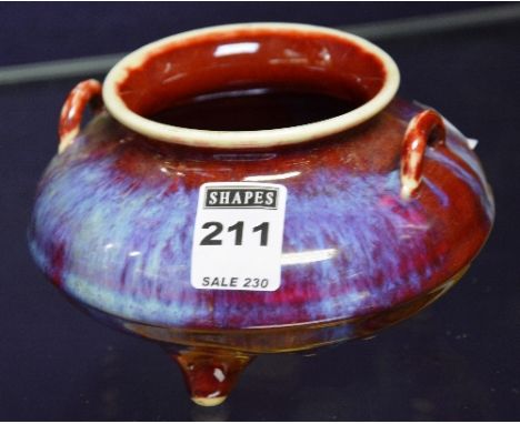 A Chinese Sang De Boef glazed pottery bowl, of small form with loop handles, reign marks to base, 9cm high x 10cm diameter CO