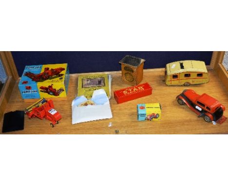 A Corgi '780' combine harvester massey-ferguson die-cast scale model, red coloured in original box, also with small corgi die