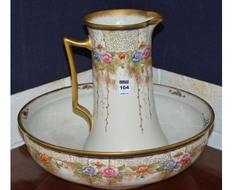 An Adderley pottery toilet ewer with matching basin, ewer 32cm high, basin 40cm high (2)