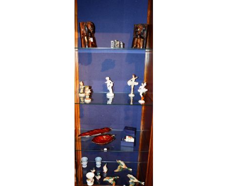 A quantity of china and Porcelain, to include set of three flying ducks, Hummel figure, and pair of african hardwood figural 