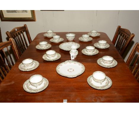 A Bavarian style china 12 piece tea service, stamped BHA to underside, decorated with floral garlands on white ground (40)