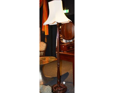 A stained wood floor lamp with shade, 185cm high