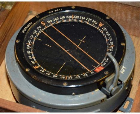 A military compass from a Lancaster bomber, with label for AM ref no 6A/0.726, in fitted oak box, 15.5cm high