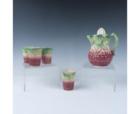 Delightful hand-painted pitcher with a juicer reamer top, featuring a raised relief design in a charming grape motif. This se