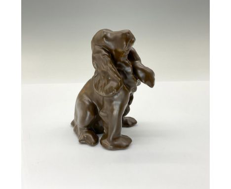 This charming cocker spaniel figurine is modeled after the dog given to John D. Wareham, former President and artist at Rookw