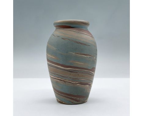 A marbled ceramic vase comprised of earth tone colors. Marked Niloak. Issued: 20th centuryDimensions: 3.5"L x 3.5"W x 5.75"HM