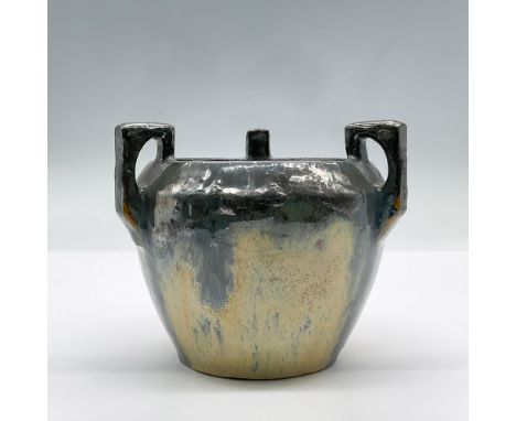 A lovely ceramic three handle yellow vase with streaked muted blue glaze. Faded makers mark stamped to the underside. Issued: