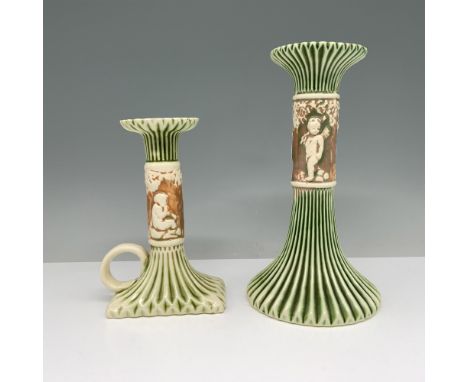 Slender neck candle holders set with green and creamed colored Corinthians and cherubs set against brown ground. Candle holde
