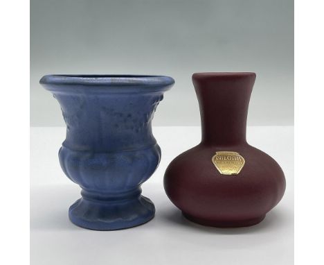A pair of lovely blue and marron glazed ceramic vases. Largest measures 3.25"L x 3.25"W x 3.75"H. Marked Niloak and Niloak st