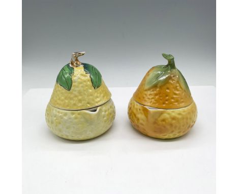 Unique kitchen item designed as pears. Lid reveals juicer-strainer that lifts out to allow clean pour. Colored in yellow, gre