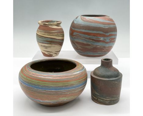This 4pc set of marbled ceramic vase features two bulbuls vases, and two smaller vases one of which has a Pensacola Golden co
