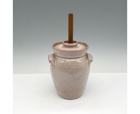 Small crock styled churn with lid and wooden churn paddle. Natural color with white glaze. M.L. Owens Pottery impressed mark.