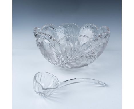 Elegant crystal bowl with etched sunflower and leaf design with sawtooth edge. Clear crystal ladle is included. Issued: 20th 