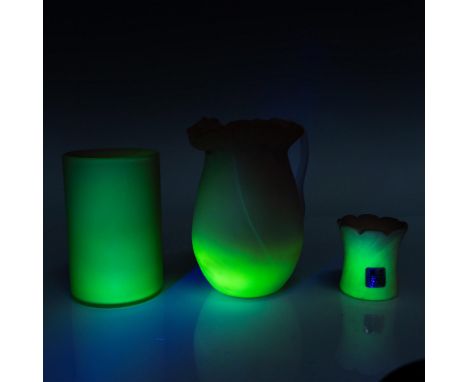 Beautiful set of pink and yellow uranium Burmese glasses in a matte finish. Features a pitcher with ruffled rim, a tumbler an