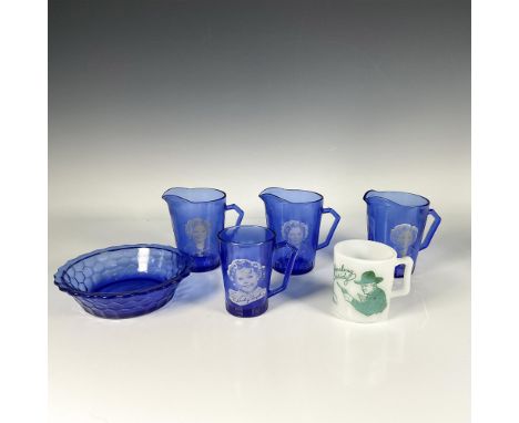 Blue glassware set featuring Shirley Temple includes three pitchers, a cup, and a bowl. Along with a white milk glass cup fea