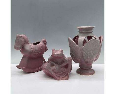 This trio of delightful ceramic pottery includes a jardiniere, and two small planters, each rendered in pink glaze with a lig