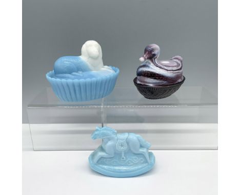 Charming assortment that consists of a milk glass blue and white dog oval shaped treasure box, an imperial slag glass swirl p