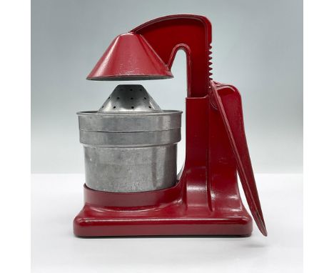 A red manual metal juicer with dome and juice collector. measures 6"L x 6"W x 6"H, can be extended to 9.25"H. Marked National