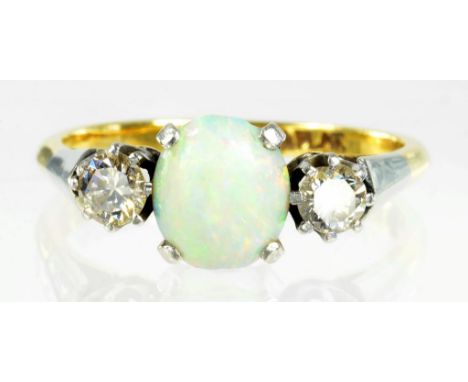 AN OPAL AND DIAMOND THREE STONE RING IN GOLD MARKED 18CT & PLAT, 3.2G