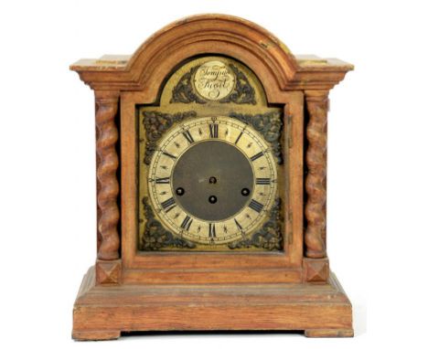 A GERMAN MAHOGANY BREAK ARCHED BRACKET CLOCK WITH BRASS DIAL AND SILVERED CHAPTER RING FLANKED BY SPIRAL TURNED PILLARS, THE 