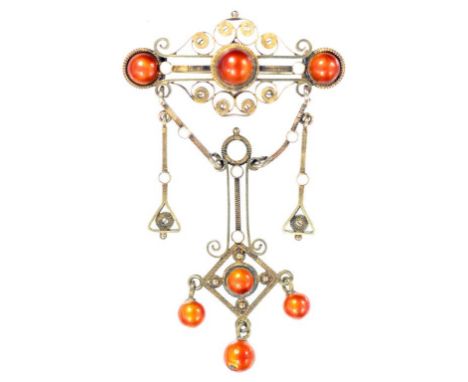 A SCANDINAVIAN SILVER GILT FILIGREE AND WHITE AND ORANGE ENAMEL BROOCH, FULLY ARTICULATED, UNMARKED, EARLY/MID 20TH CENTURY