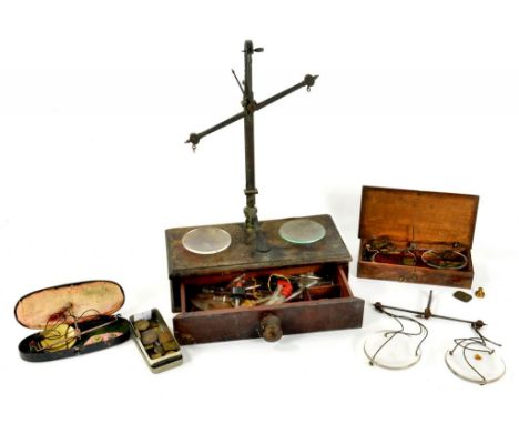 A SET OF VICTORIAN BRASS APOTHECARY'S BEAM SCALES WITH GLASS PANS, ON MAHOGANY BASE WITH DRAWER ANOTHER SET IN OAK BOX, A QUA