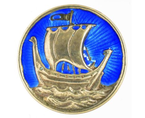 AN ARTS AND CRAFTS SILVER AND TRANSLUCENT BLUE ENAMEL LONGSHIP BROOCH, MAKER A.H.D INCUSE, BIRMINGHAM 1919