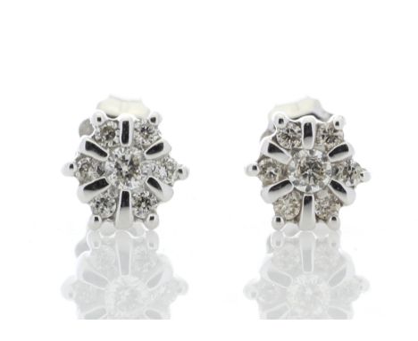 Fourteen round brilliant cut diamonds are set to mimic a flower shape in these beautiful 9ct white gold diamond earrings.Item