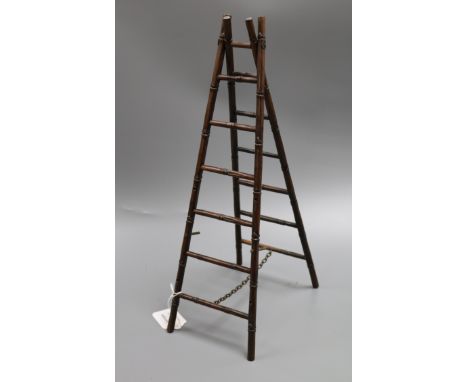 A hardwood miniature easel, modelled as a step ladder, 45cm