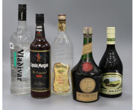 Five assorted bottles of spirits, Vlakivar vodka, Cointreau, Captain Morgan rum
