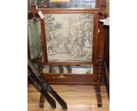 A late Victorian mahogany firescreen with an inset machined tapestry panel W.66cm