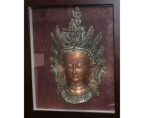 A copper relief and Thai princess in light up display case