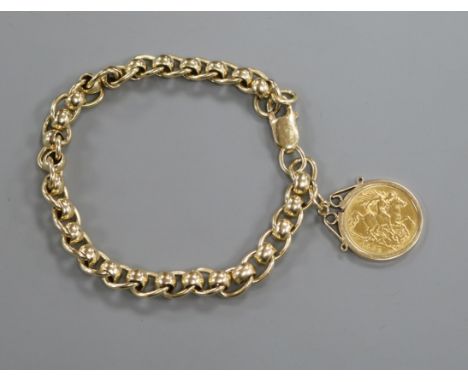A 9ct gold bracelet hung with a mounted half sovereign.