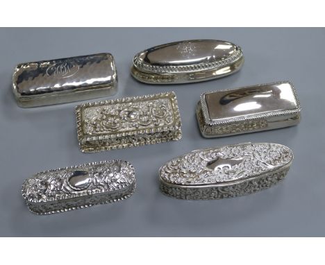 Six Victorian and later silver trinket boxes, including three foliate-embossed examples, one rectangular, one oval, one navet