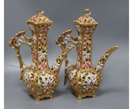 A pair of Zsolnay Pecs pierced ewers 30cm high