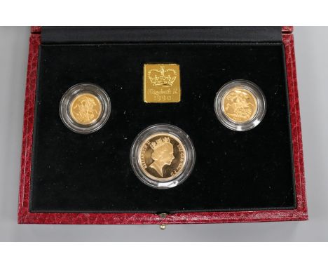 A cased UK gold proof sovereign three coin set 1990, comprising half sovereign, sovereign and two pounds, with certificate.
