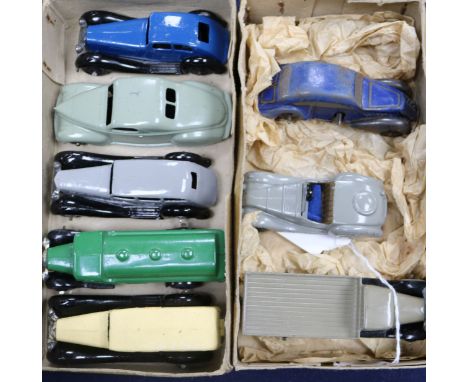 Seven early Dinky die-cast models and a clock work Citroen car in a Dinky Toys 6 Vauxhall 30D box