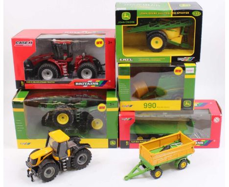 A collection of various boxed and loose Britains model tractors and farm implements to include a Case IH350 4-wheel drive Sti