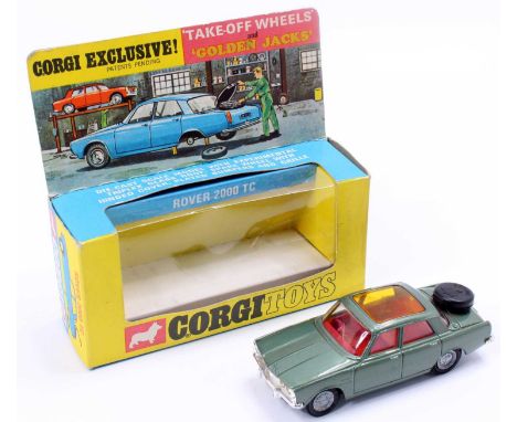 Corgi Toys No. 275 Rover 2000TC comprising of a metallic green body, with red interior, amber glazing, and take off wheels, i