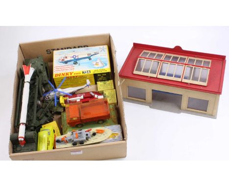 A tray containing a collection of Dinky Toys, with examples including No. 438 Ford D800 Tipper Truck, No. 410 Bedford Van "Be