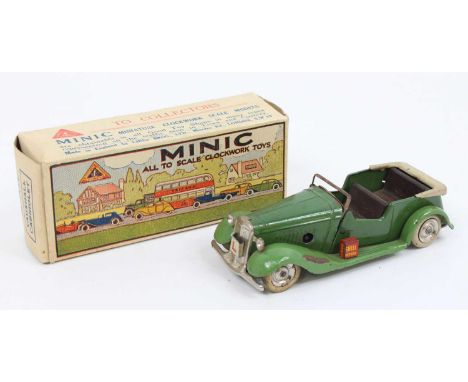 Triang Minic, No.17M Vauxhall Cabriolet, comprising pre-war green body with wooden interior, white tyres and spun hubs in the