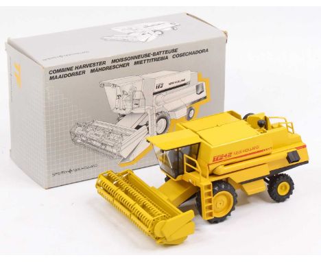 An NZG No. 269 1/42 scale diecast model of a Sperry New Holland Combine Harvester finished in yellow, housed in the original 