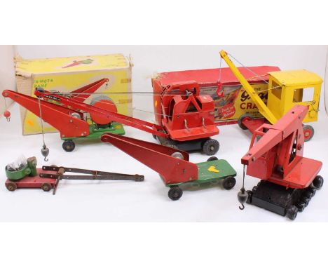 A collection of tin plate and pressed steel large scale construction model cranes, to include a Brem Products four wheel tin 