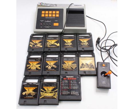 An original Radotin programmable TV game console, together with a number of cartridges to include Showdown in 2100AD, Footbal