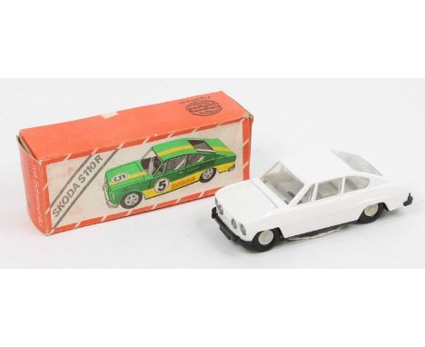 1970s East German 1/30th scale plastic friction drive saloon Skoda S110R, white plastic body with black base plate, and grey 