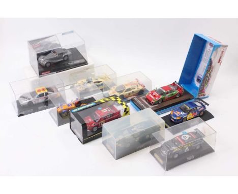 A mixed collection of 10 various 1/32nd scale slot cars including a Carrera Evolution Morgan Aeromax, a Scalextric C2364 Mits