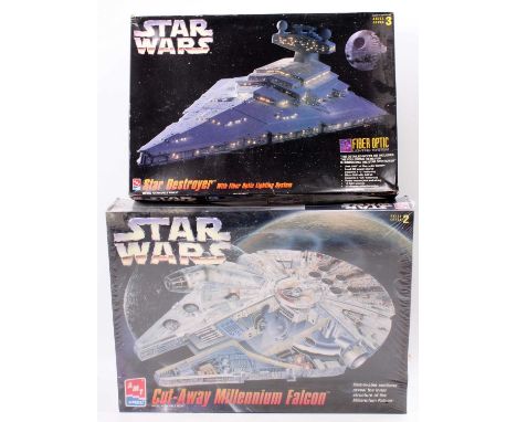 A Star Wars AMT/ERTL boxed plastic kit group, to include a Cutaway Millennium Falcon, housed in the original card box with or