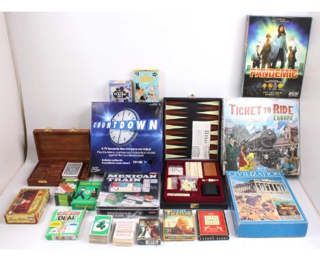 One box containing a collection of mixed vintage and modern release board games including Ticket to Ride, Pandemic by Z Man G
